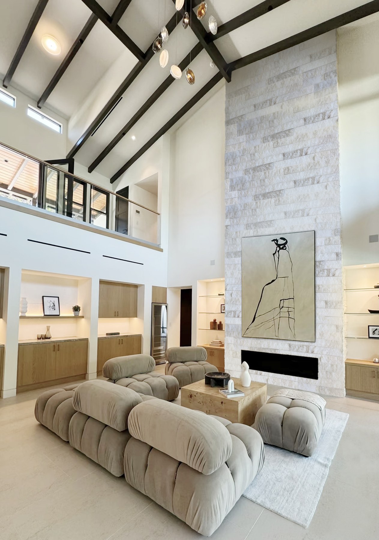 Natural stone feature wall in a double-height living room